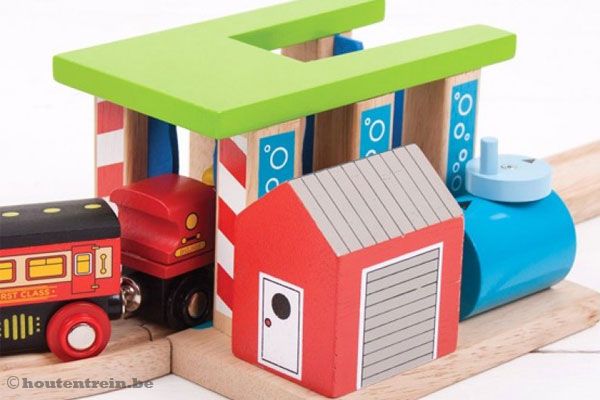 Rij uw trein (niet inbegrepen) door de wasstraat.